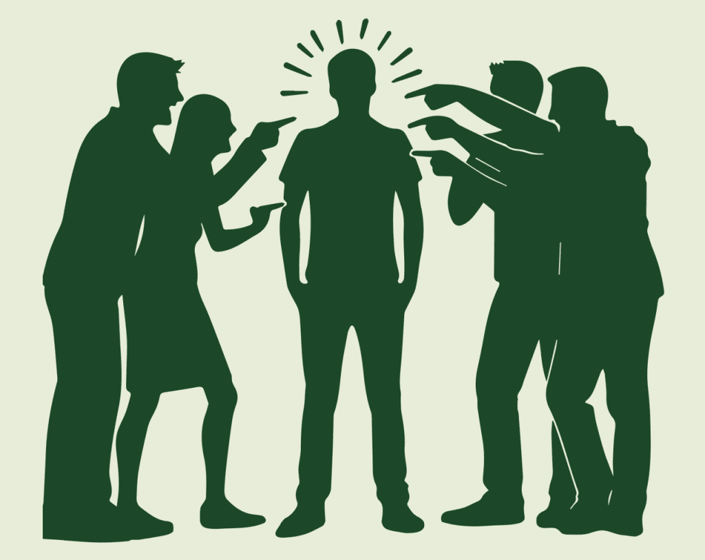 Group pointing at one individual